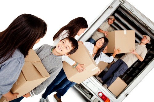 Van and mover arranging items for an accessible London move