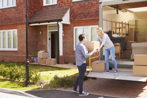 Professional removal team handling furniture pick-up in London